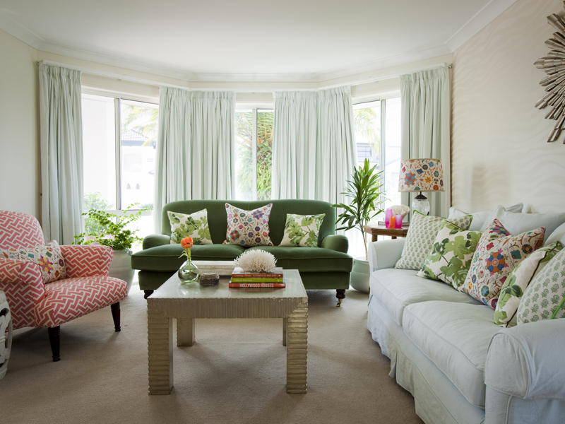 The design of the living room with a bay window in the style of a country